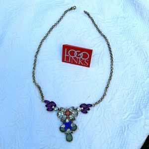 Logo links antique gold muted green, royal blue, amethyst, clear and peach-rose